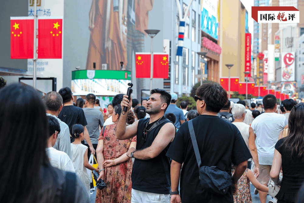 世界又看到一个“流动的中国”新葡京国际锐评｜这个黄金假期